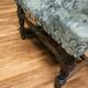 Empire armchair in carved wood and floral fabric