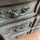 Antique Louis XV style commode, aged finish, practical elegance.