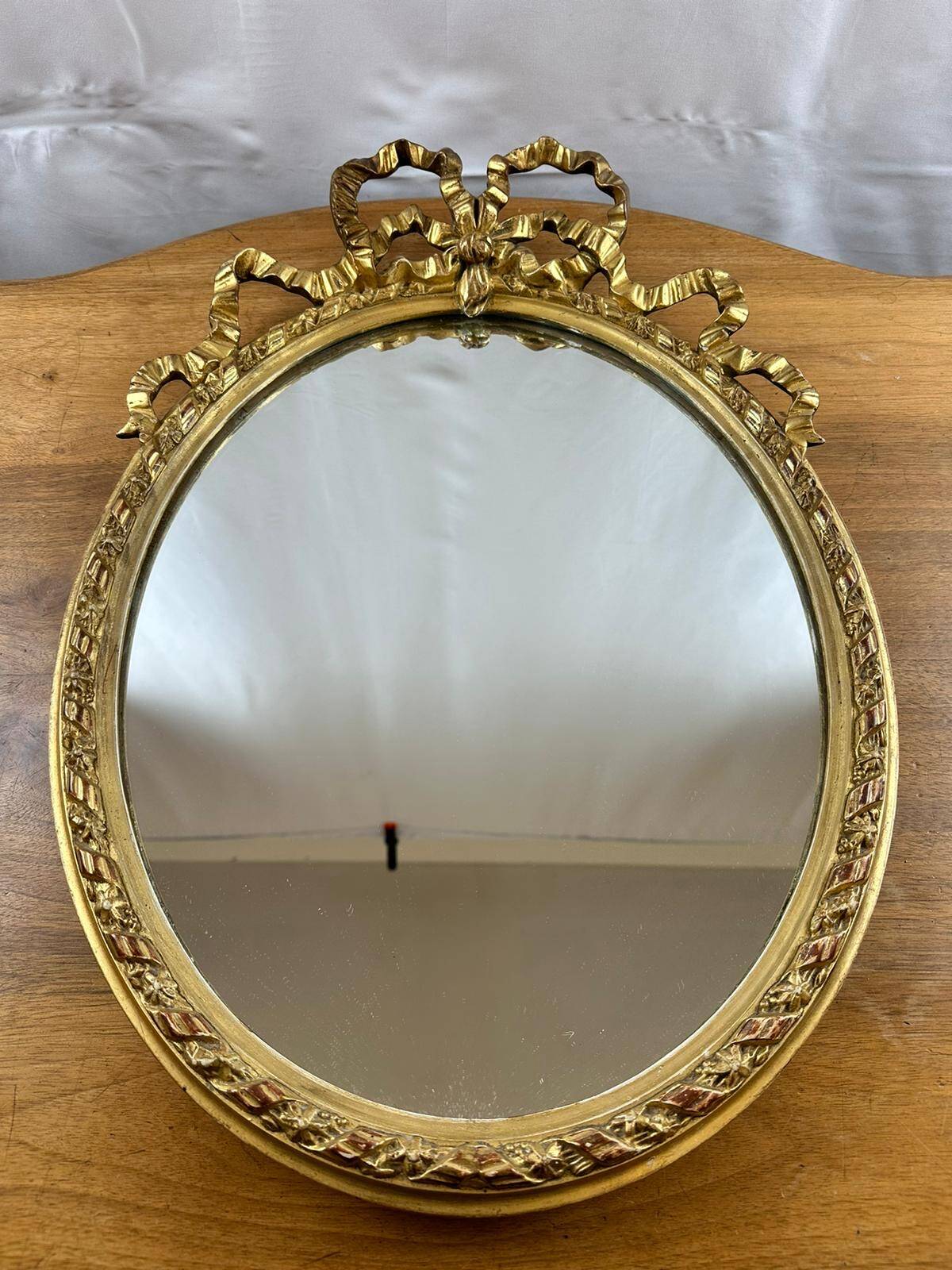 Louis XVI style oval mirror