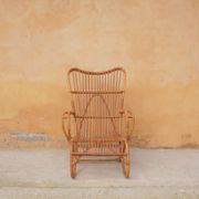 Vintage rattan chair by Louis Sognot