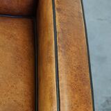 Art Deco sheep leather armchair with a lot of character