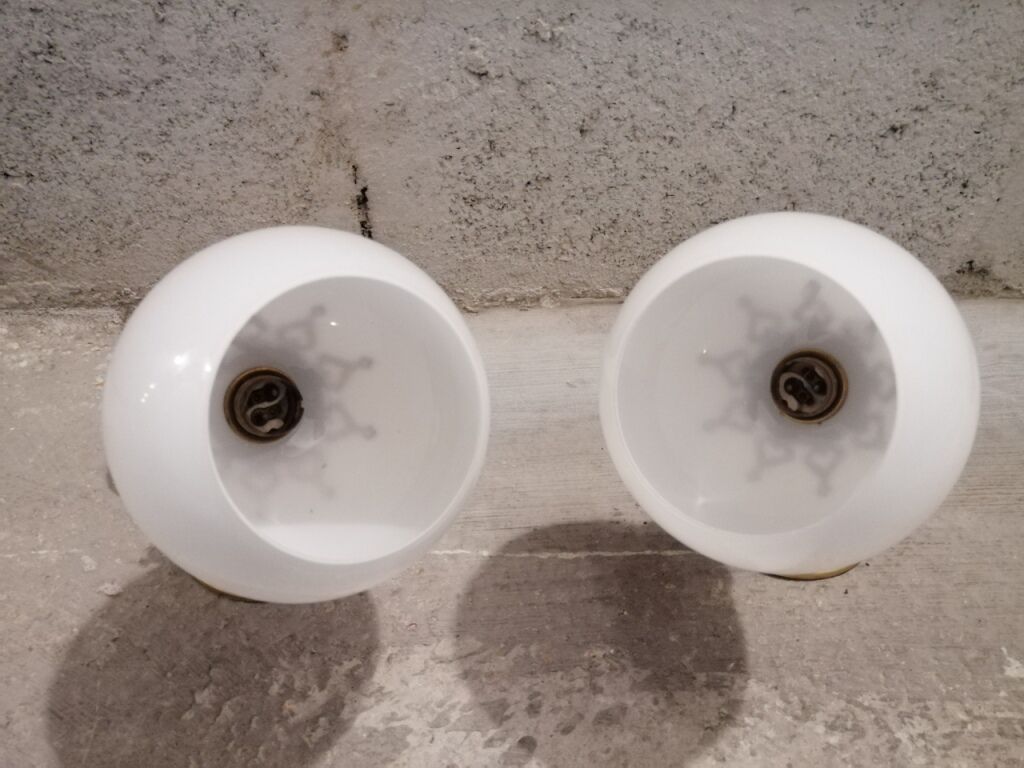 Pair of brass boat swivel appliques - opalin glass globe