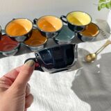 Vintage black earthenware coffee cups with multi-colored background, 1970s