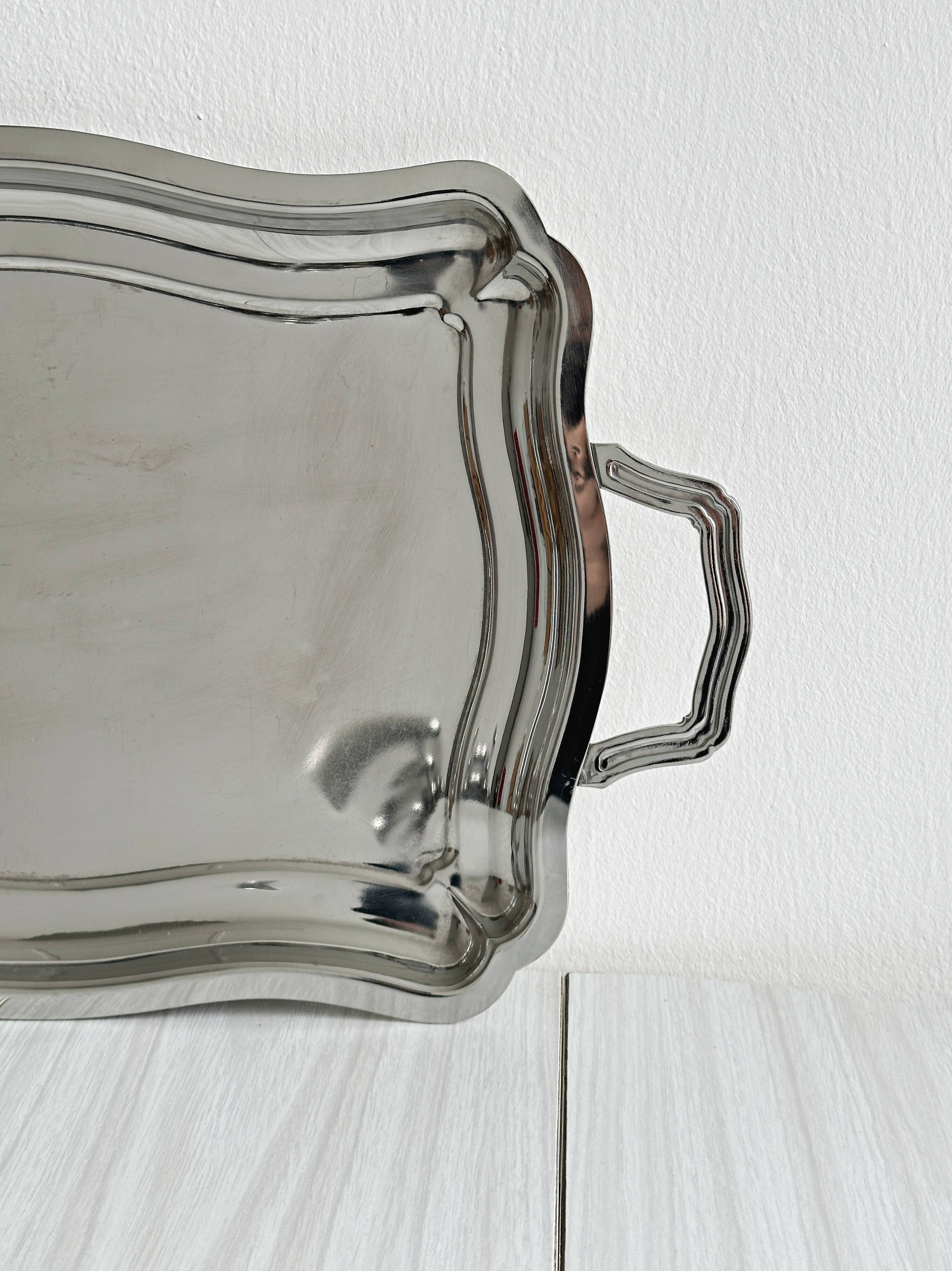 Shiny stainless steel plate.