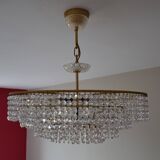 Old chandelier with tassels and brass
