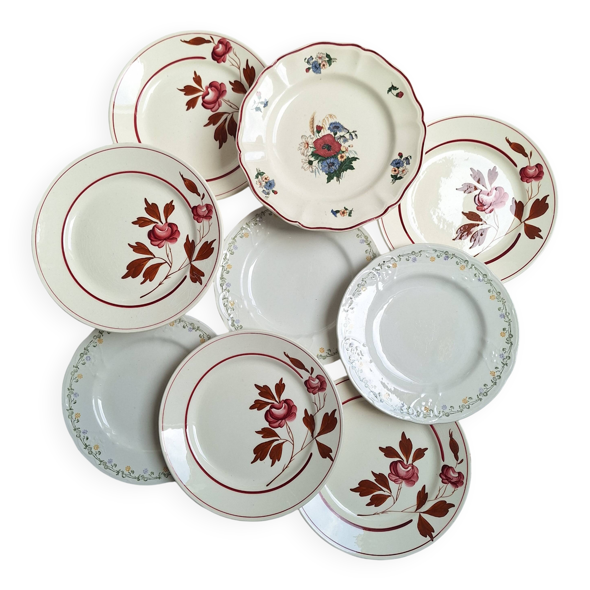 Vintage flower dessert plates from Sarreguemines, Longwy, and Lunéville.