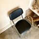 Chaise en aluminium chromé et skaï noir
