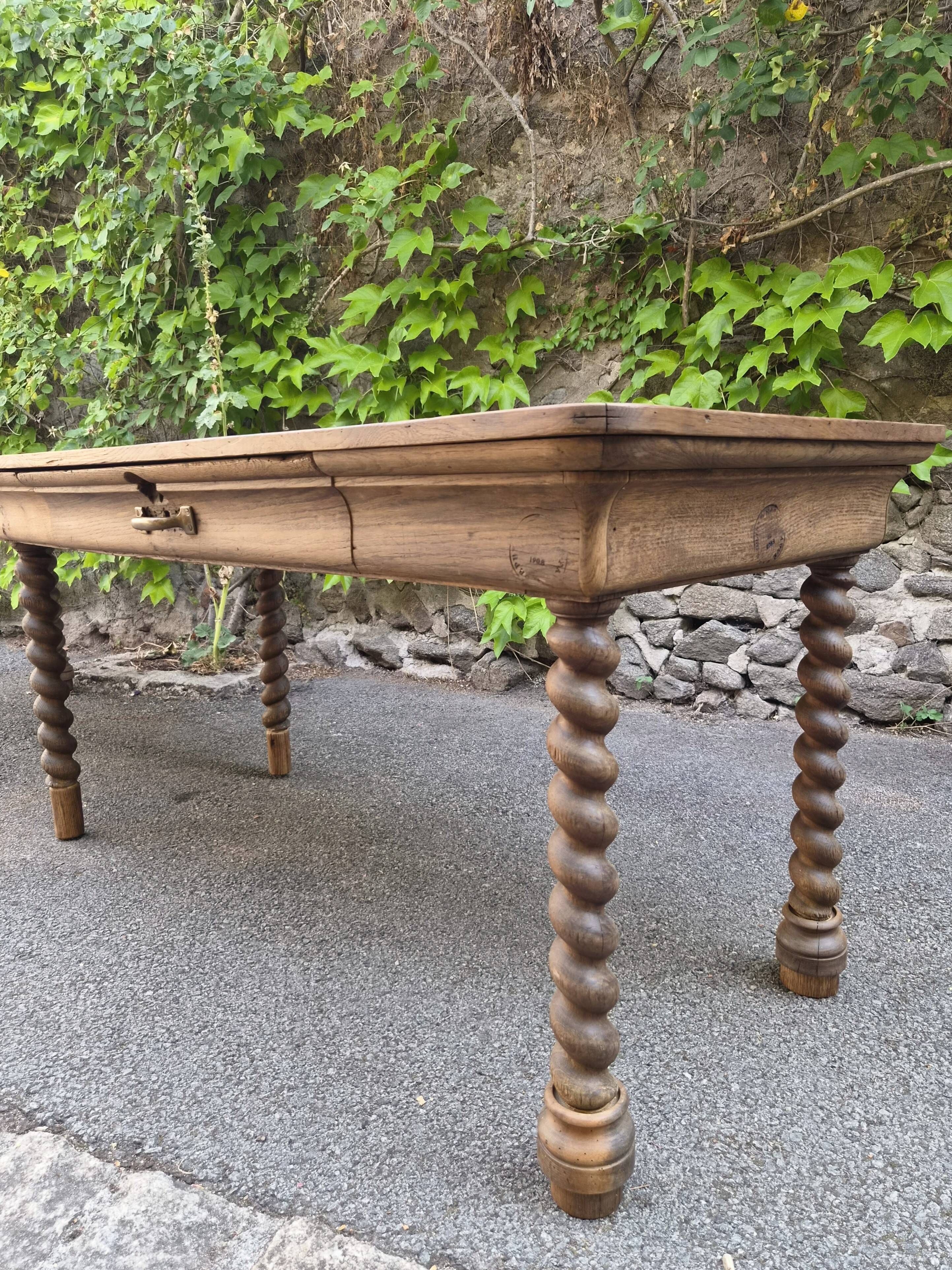 Antique French draper's table in oak, shop counter, work table, 6 feet, circa 1750–1850.