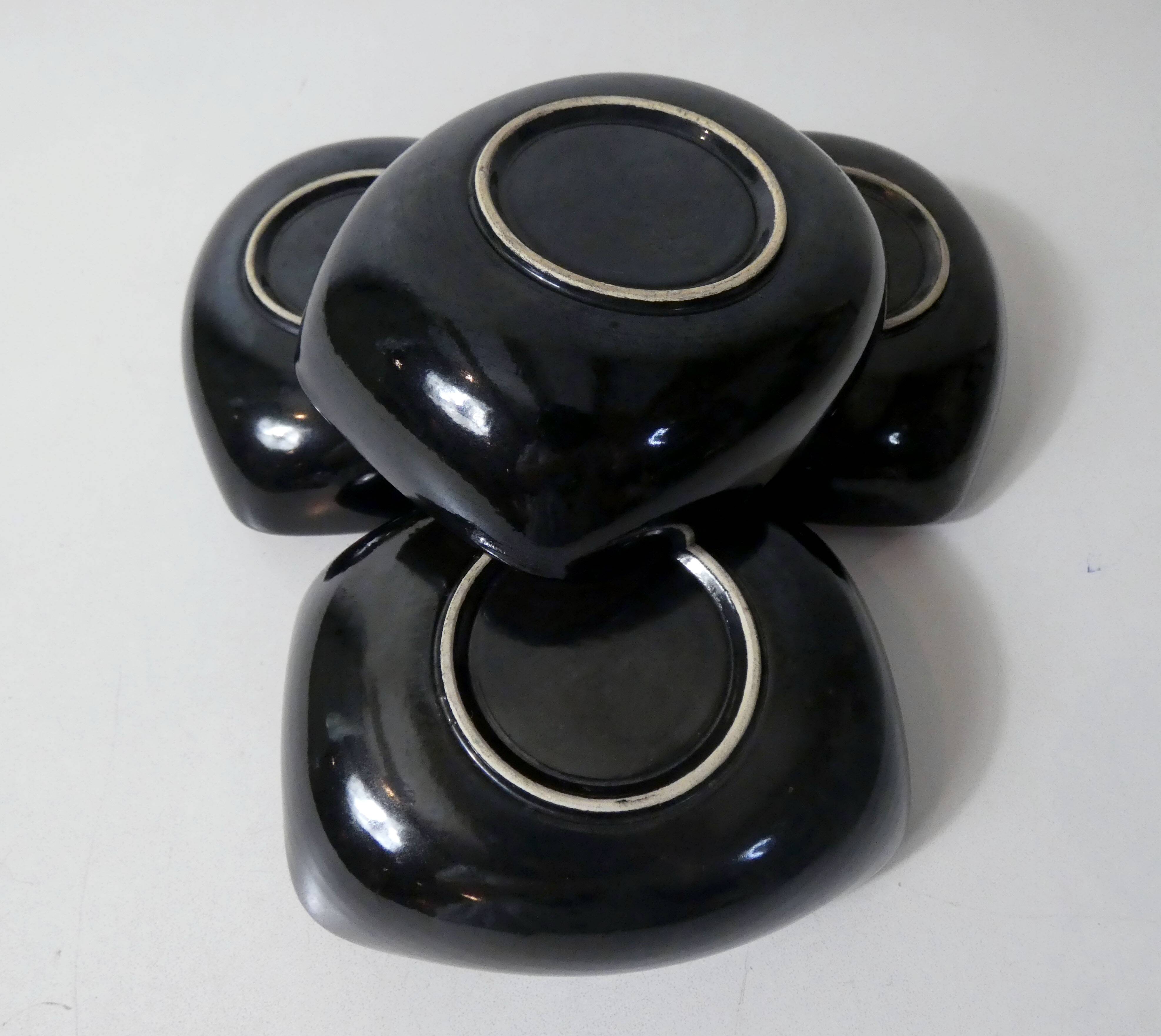 4 vintage ceramic bowls with free-form design