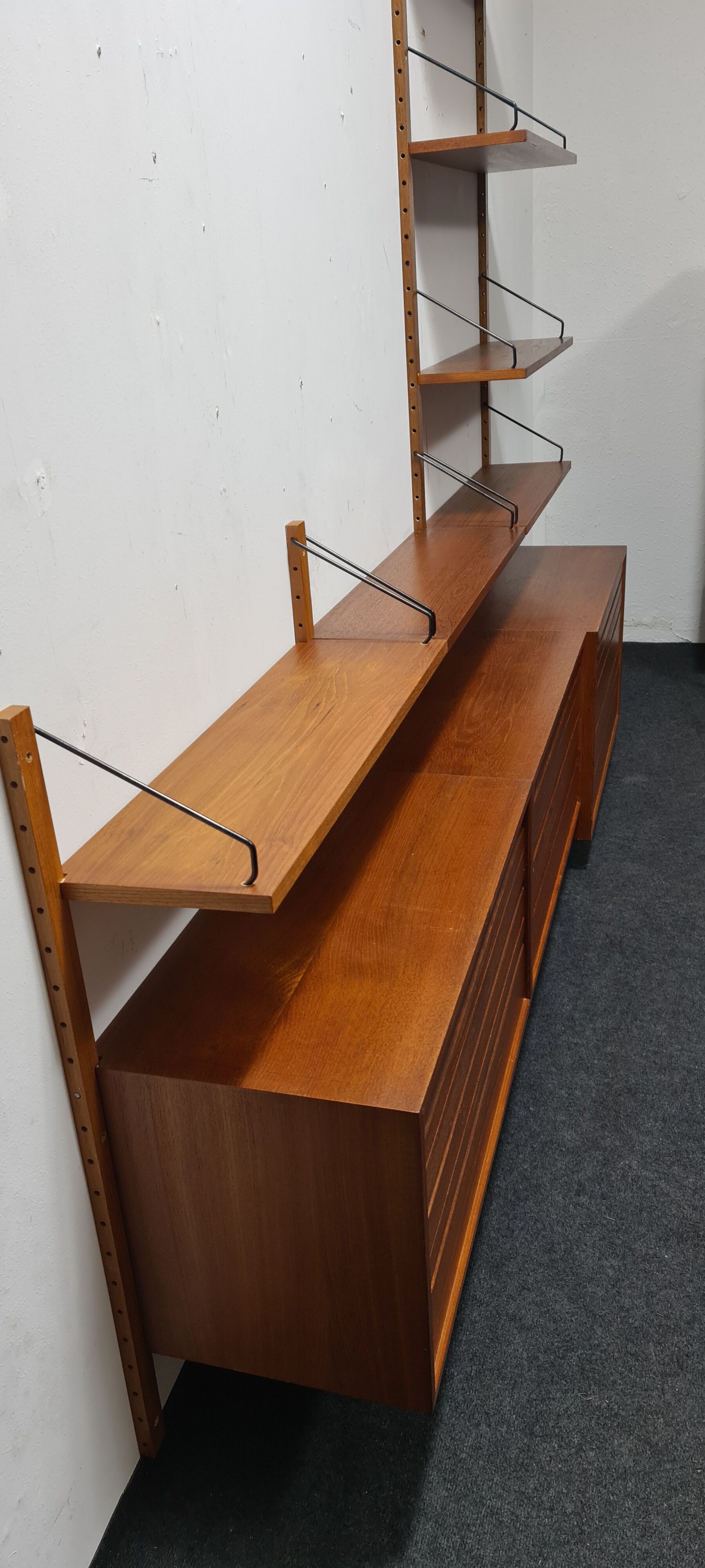 Teak wall unit by Poul Cadovious