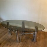 Table basse chrome et verre fumé ovale années 70