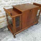 Bar cabinet on casters in walnut