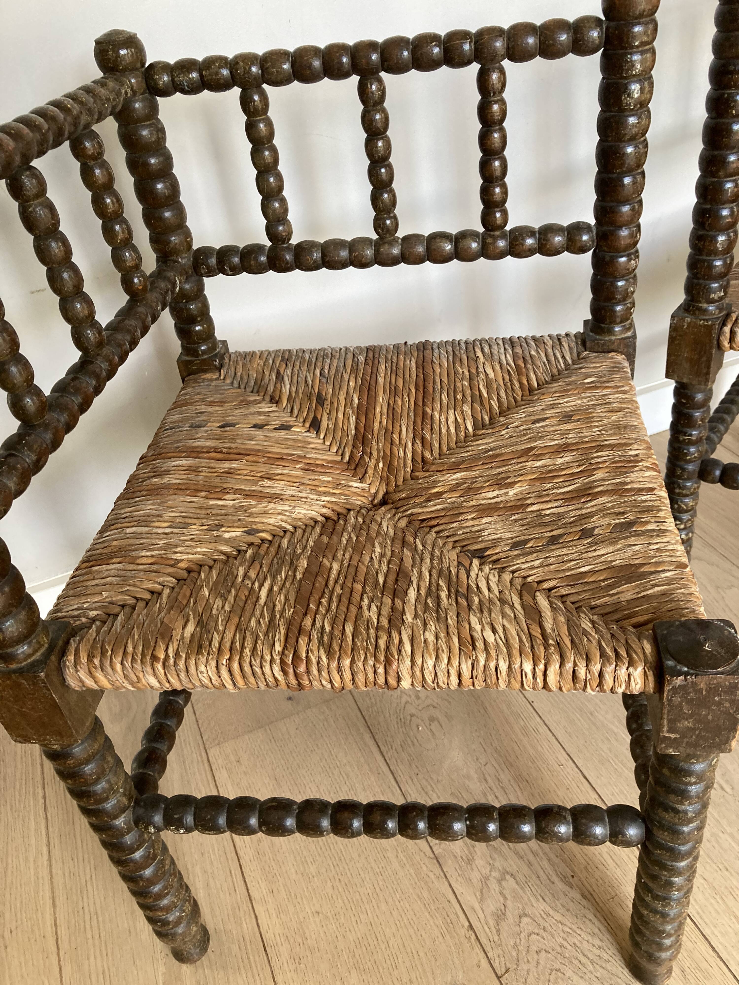 Turned wood corner armchairs