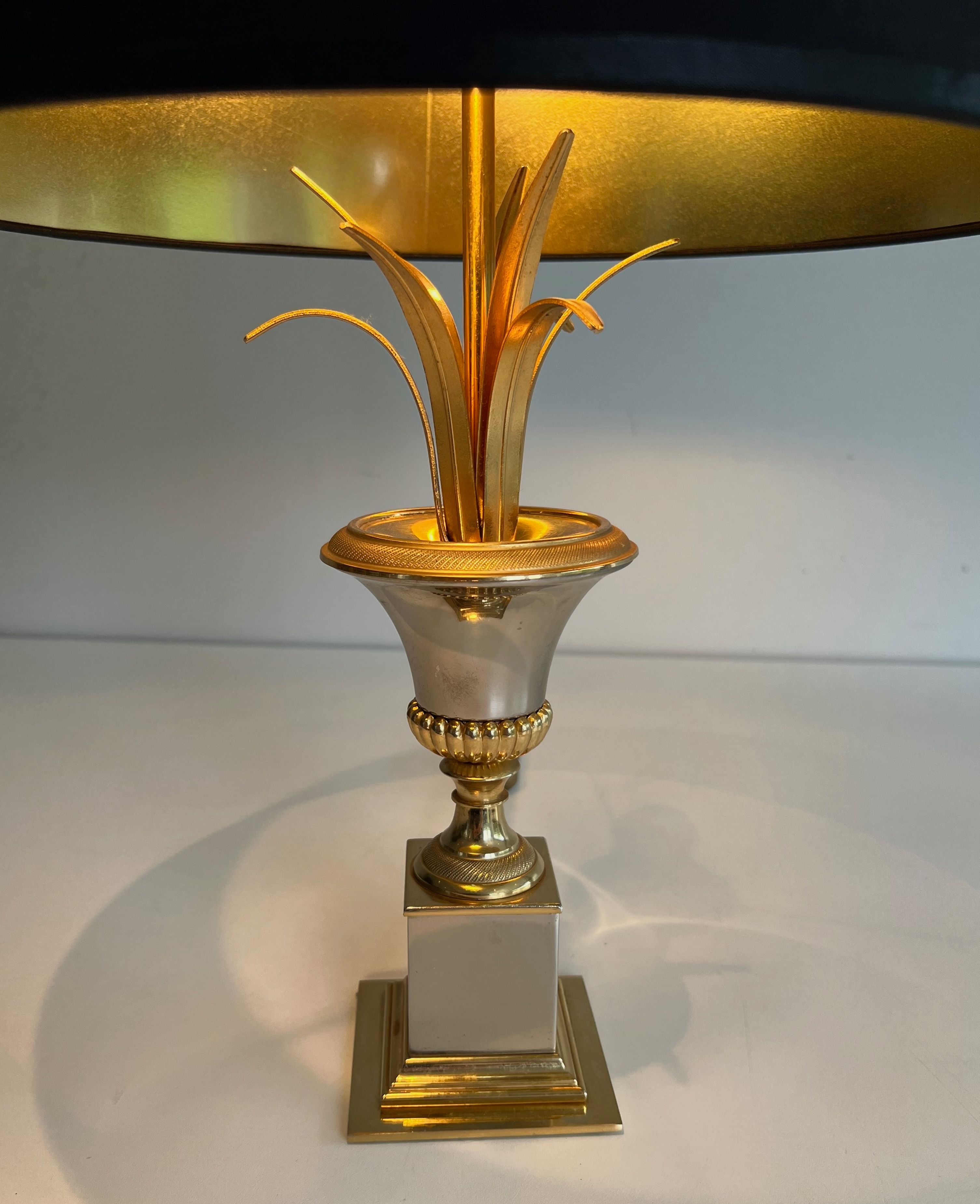 Pair of palm lamps in chrome and brass in the style of Maison Charles. Circa 1970.