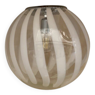 Contemporary transparent and white sphere pendant in murano glass