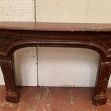 Pair of Louis XIV style fireplaces in red cherry marble. XIX century.