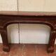 Pair of Louis XIV style fireplaces in red cherry marble. XIX century.