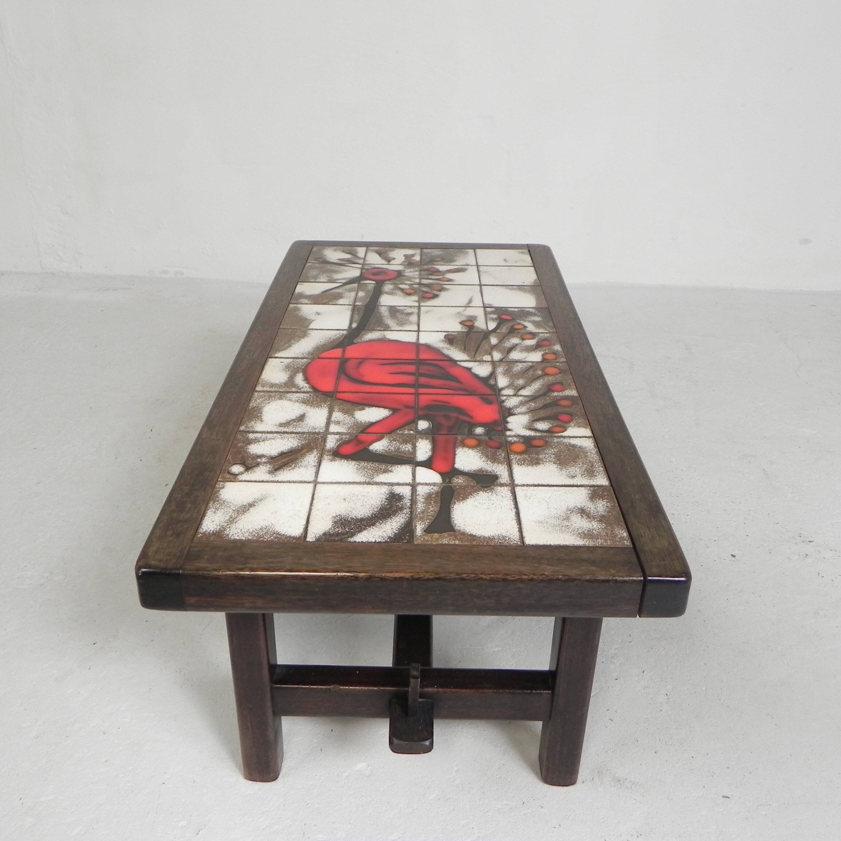 Square tile table from Vallauris, signed Dan with an image of a fantastic bird, 1960s.