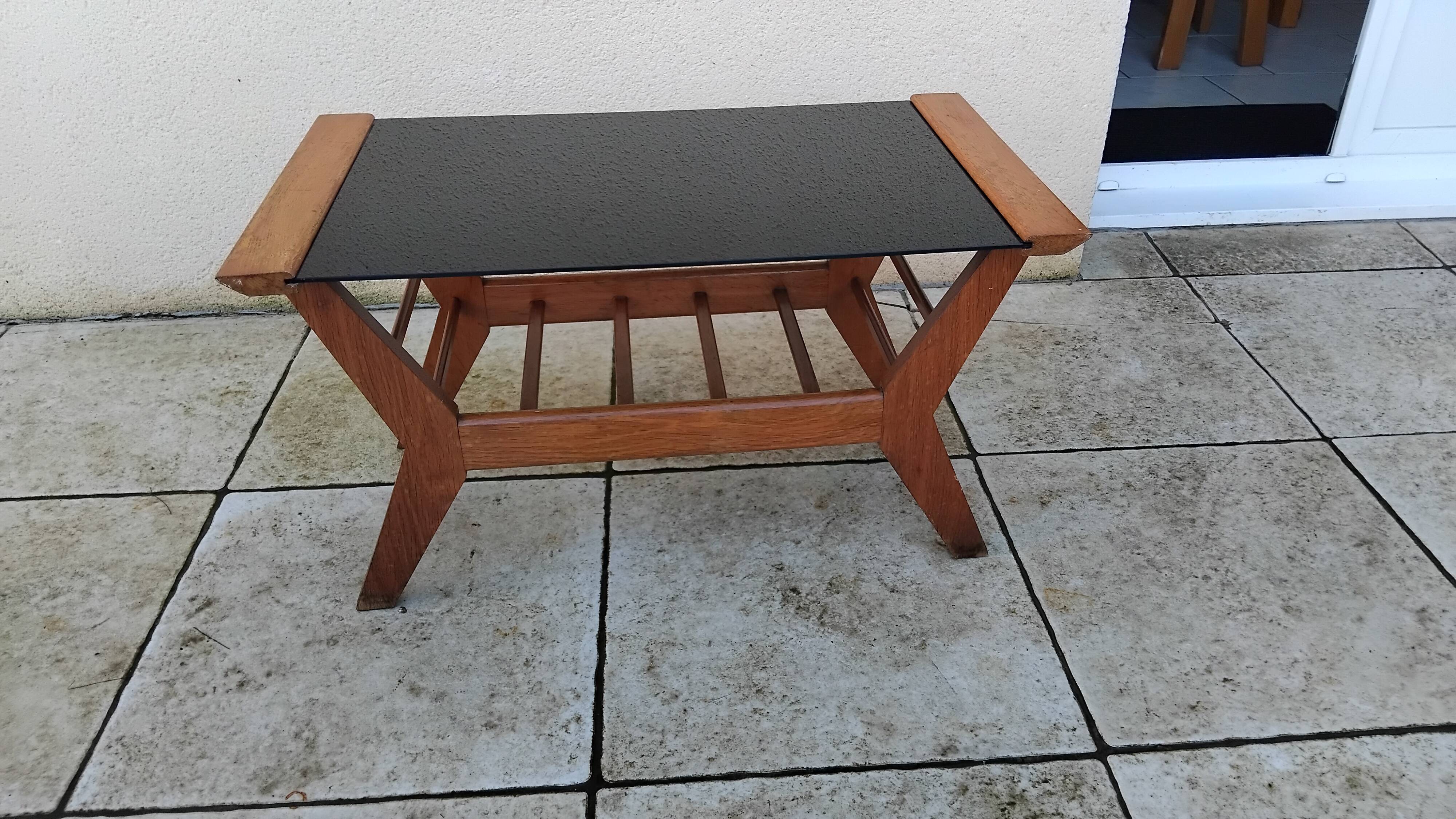 Vintage coffee table from the 1950s reconstruction, wood and glass.