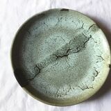 Emailed sandstone plate