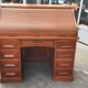 Old American desk in solid oak with S-shaped shutter