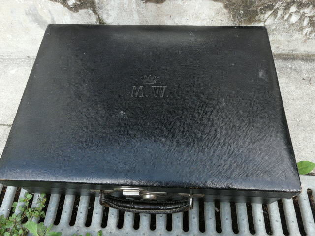 Leather suitcase with baron's crown and mw monogram