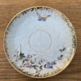 Porcelain cup with earthenware lions