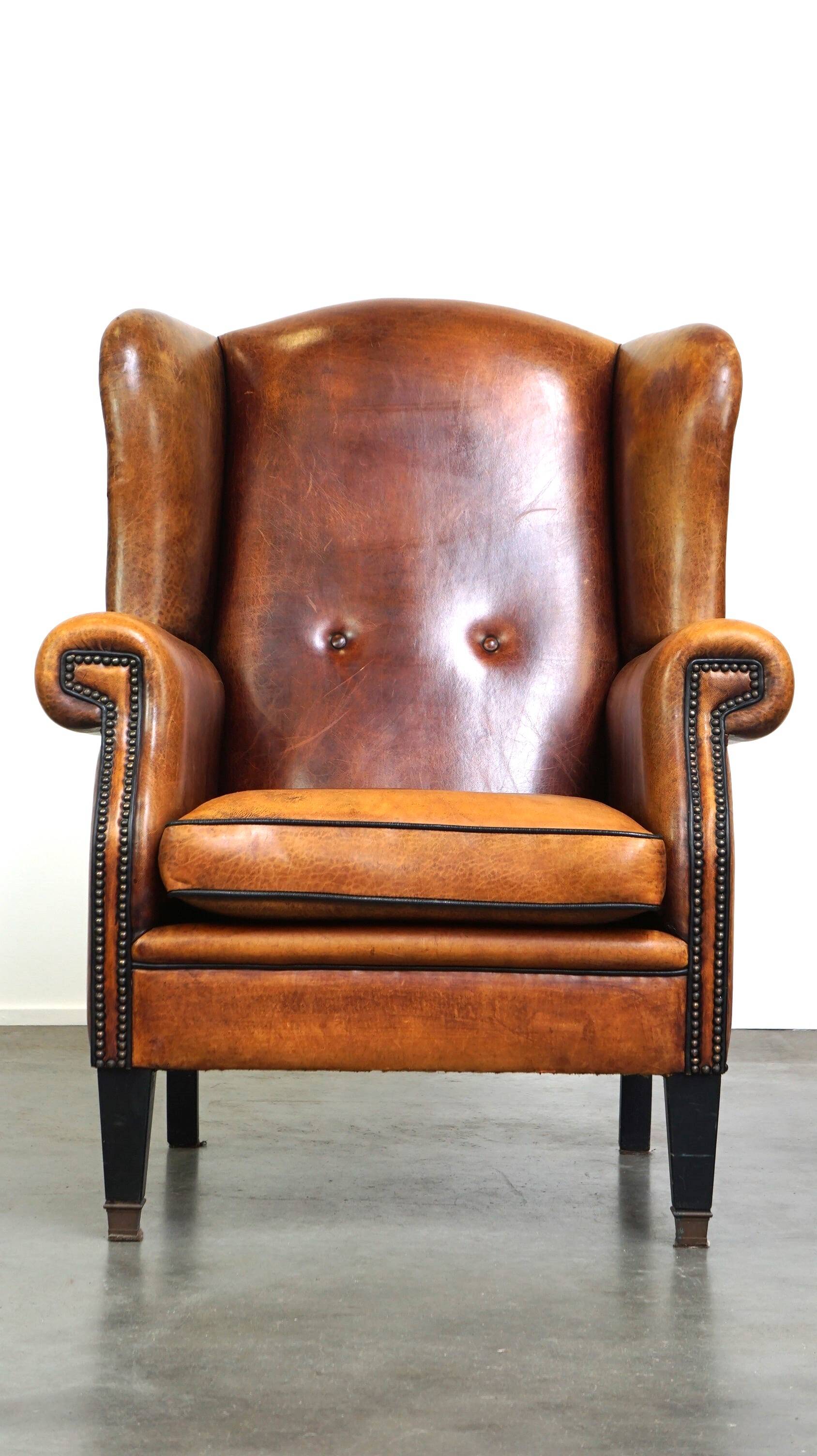 Sheepskin leather chair with a beautiful patina