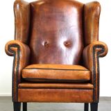 Sheepskin leather chair with a beautiful patina