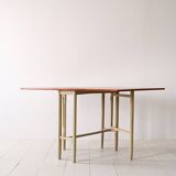 Vintage table with folding wings