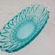 Vintage blue-green turquoise plate in cut and relief glass.
