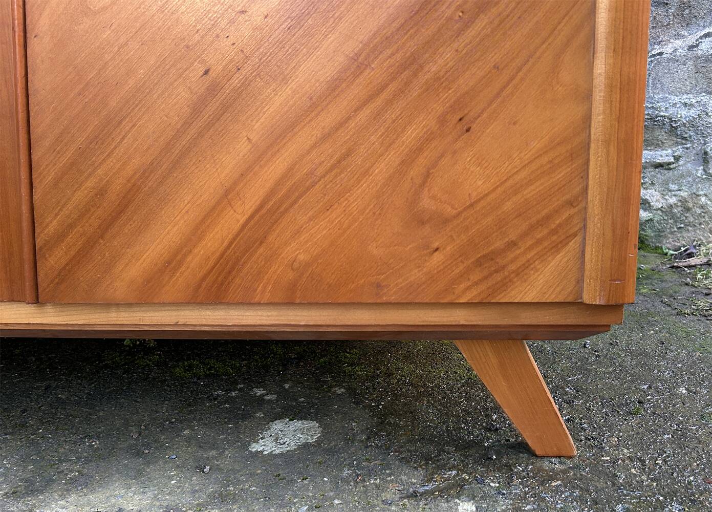 Mid-century wardrobe from the 1960s in wood, with a chevron front and tapered legs.