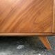Mid-century wardrobe from the 1960s in wood, with a chevron front and tapered legs.