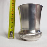 Old silver metal timbale with punch