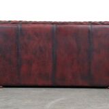 Beautiful red cowhide sleekly designed Chesterfield 2-seater sofa