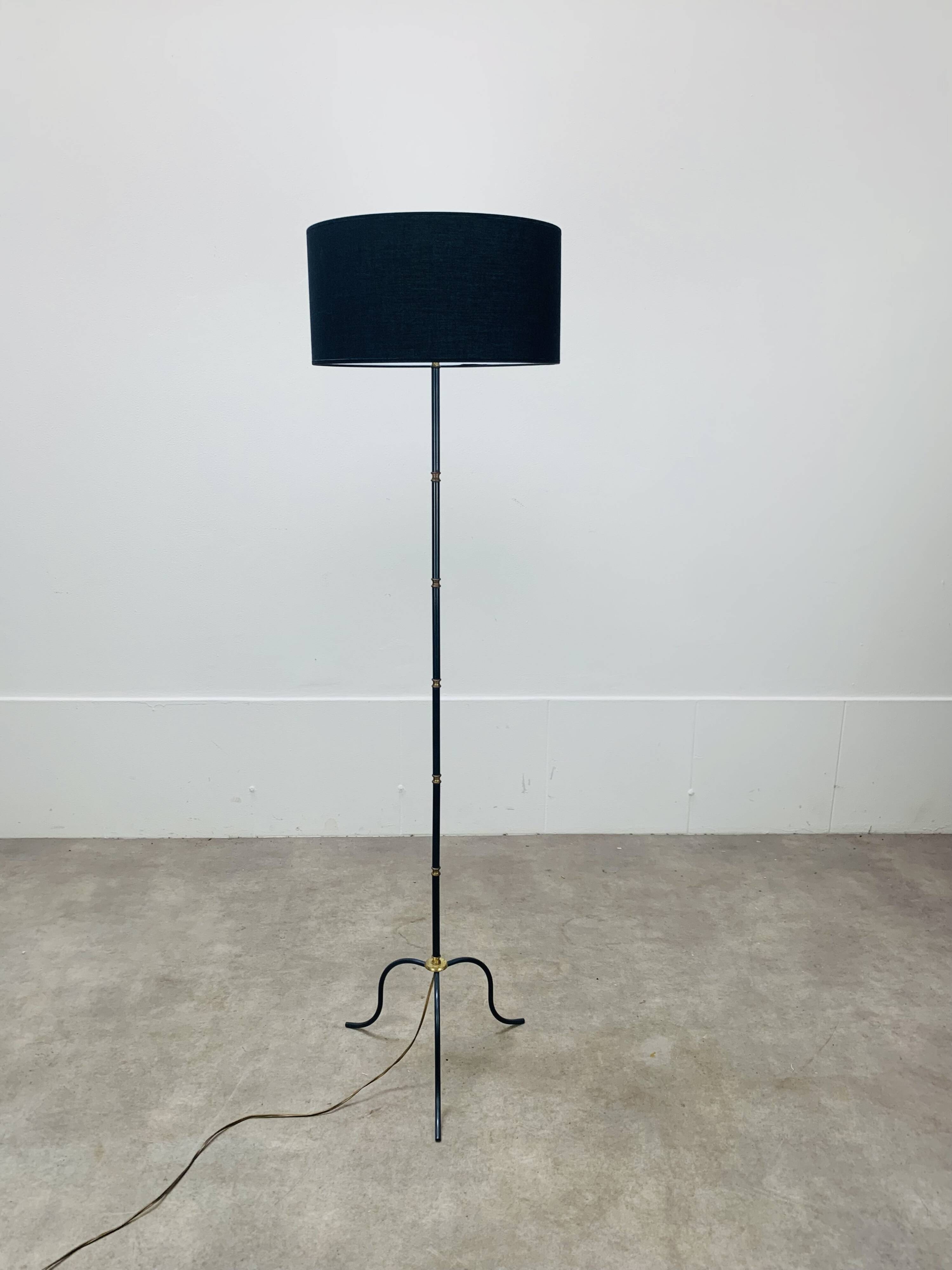 1950s tripod floor lamp, brass and black metal