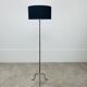 1950s tripod floor lamp, brass and black metal