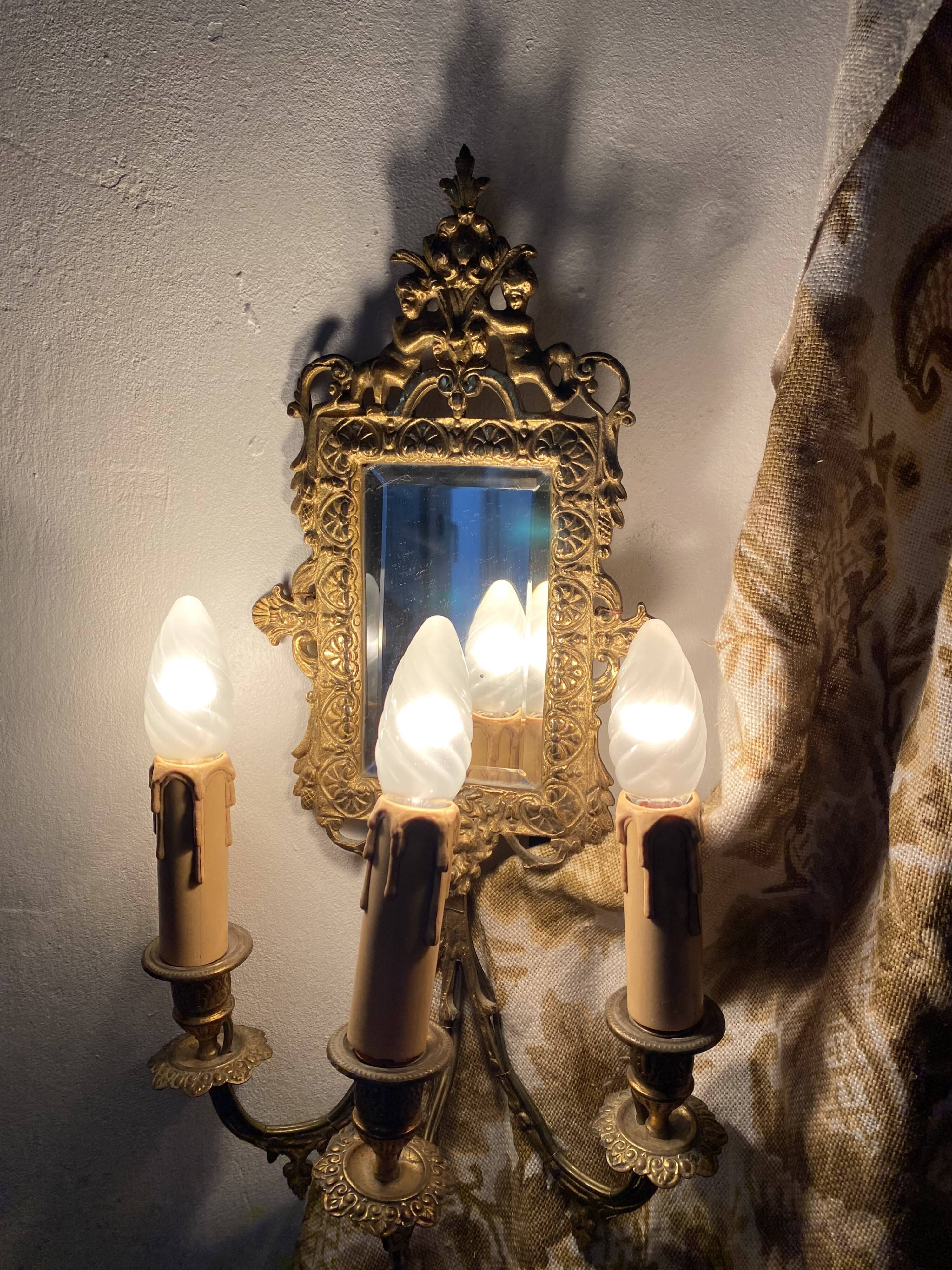 19th-century Napoleon III style gilded bronze wall sconce with bevelled mirror.