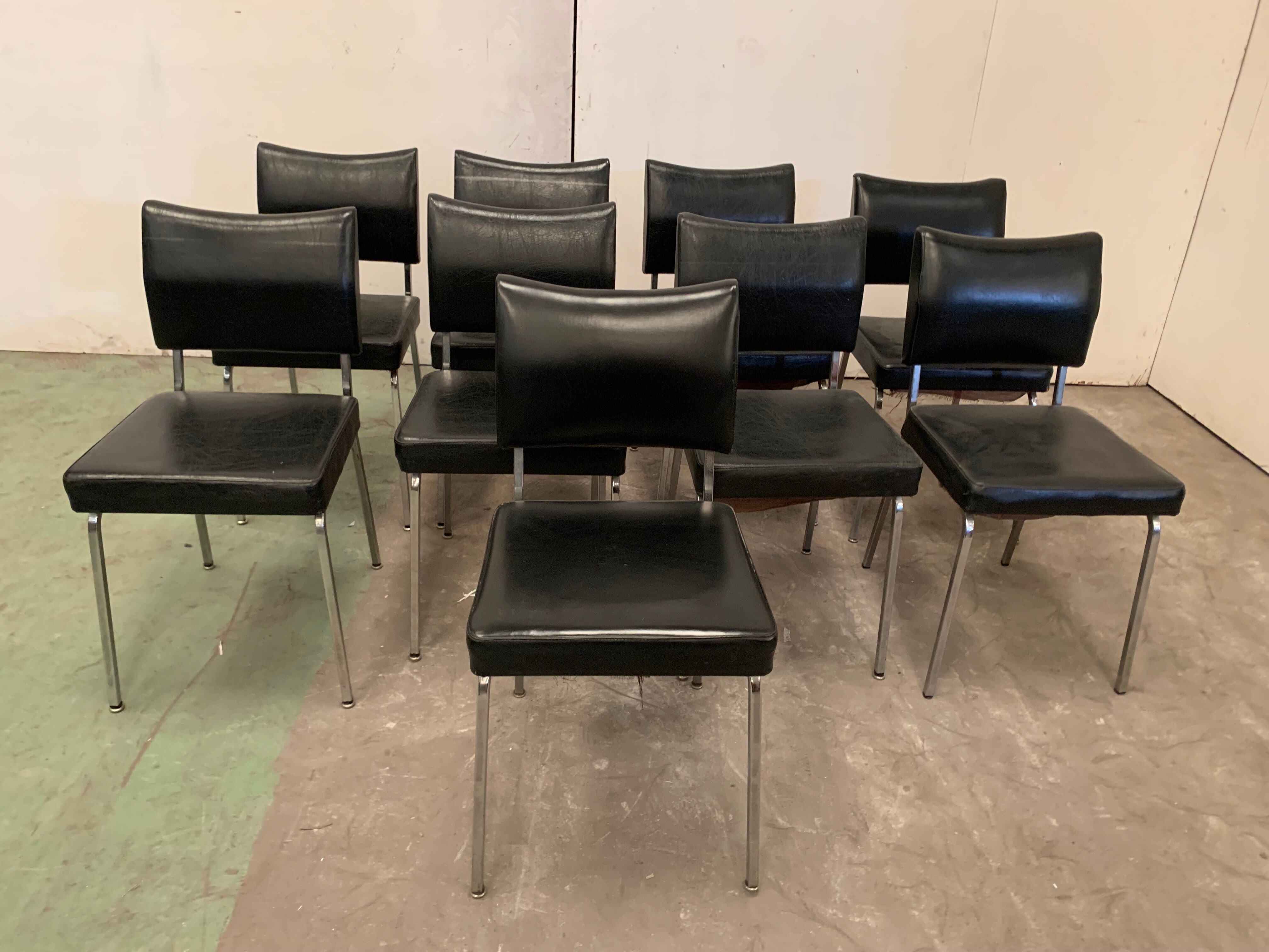 Suite of nine vintage chairs in chrome and imitation leather XX century