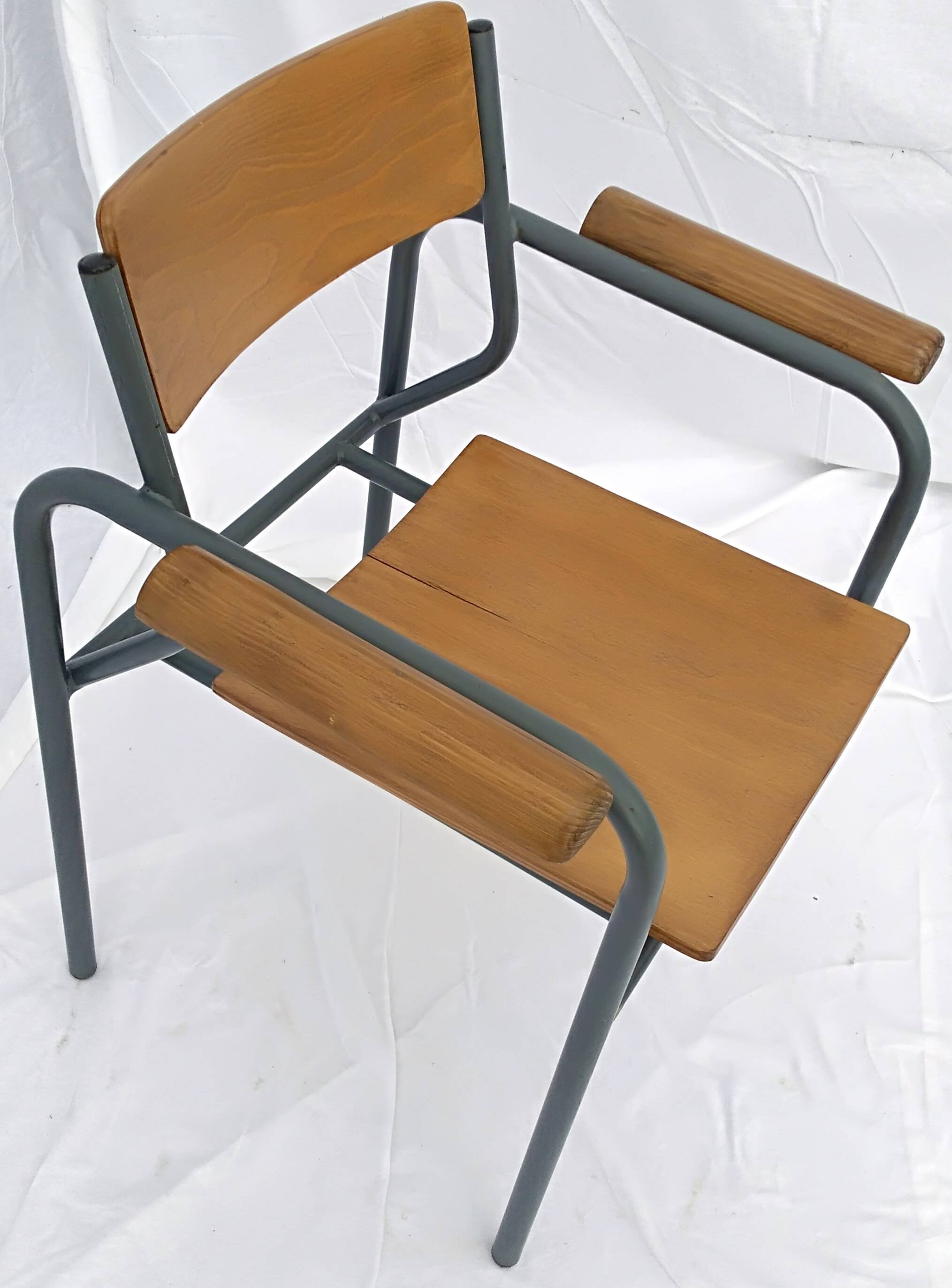 armchair tubular structure wooden seat and armrests