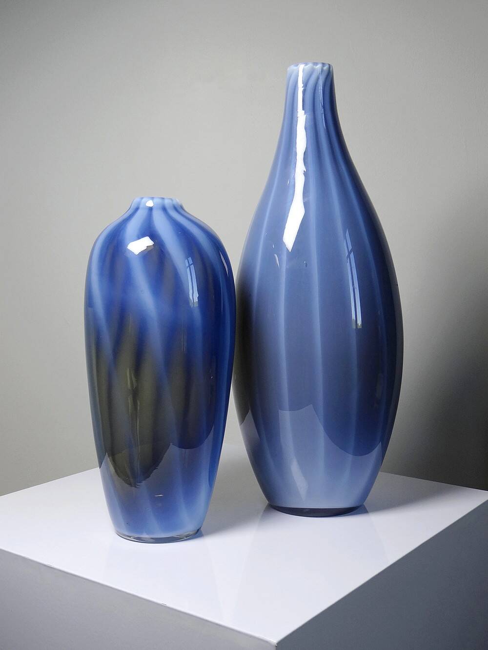 Pair of vintage smoky glass vases lined with opaline Murano bubble glass.