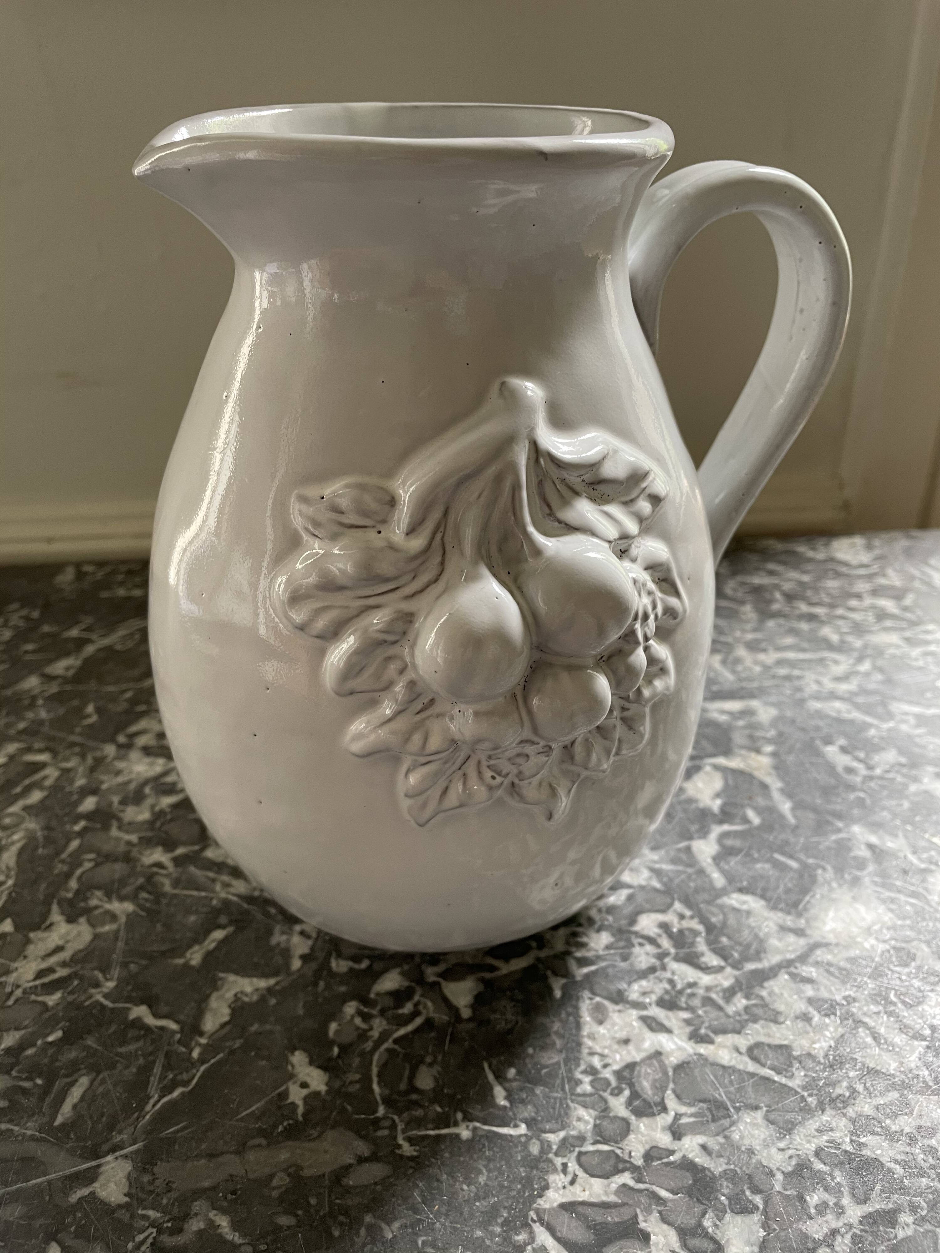 Pitcher in dabbling cherry decoration