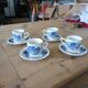 4 antique cups and saucers