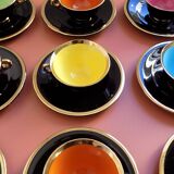 set of 9 black and gold Salins cups and saucers