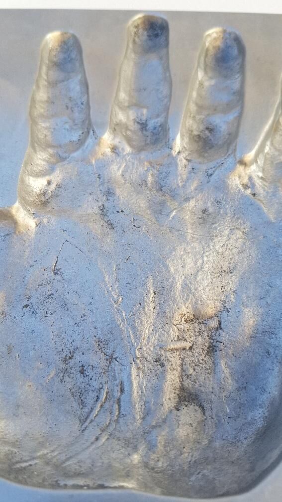Trinket bowl hand print in 1970s aluminum