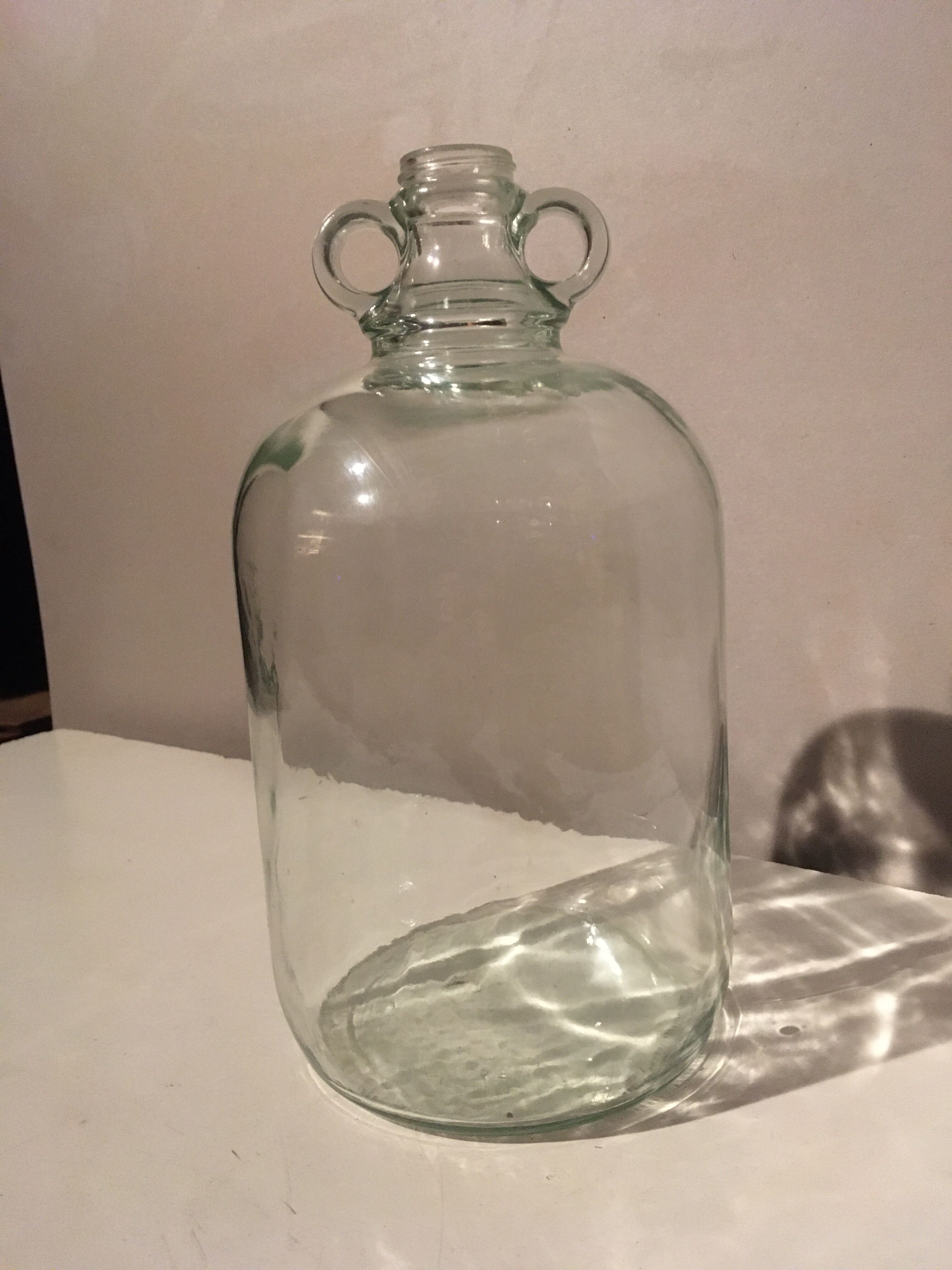 Demijohn in transparent glass