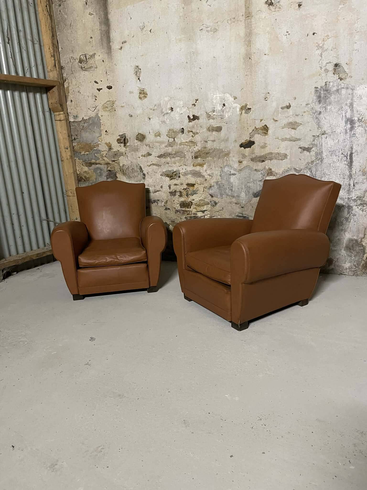 Pair of vintage club style armchairs in camel faux leather.