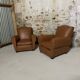 Pair of vintage club style armchairs in camel faux leather.