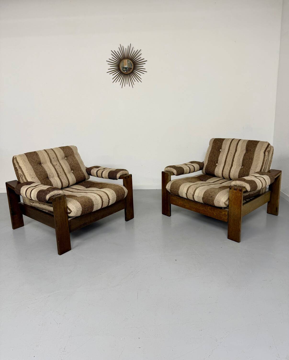 2 vintage 1970s wooden and fabric armchairs