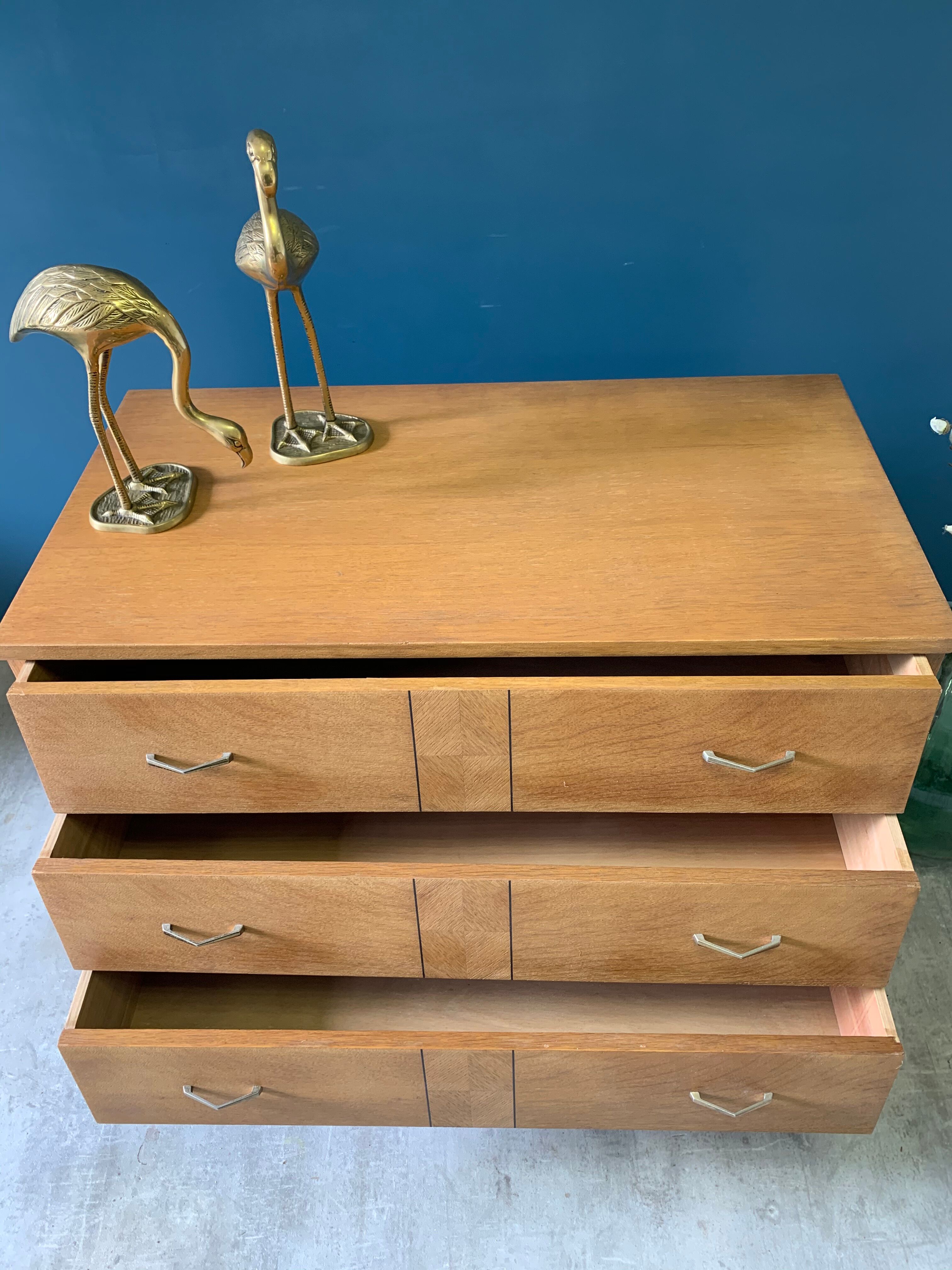 Vintage chest of drawers with wing drawers
